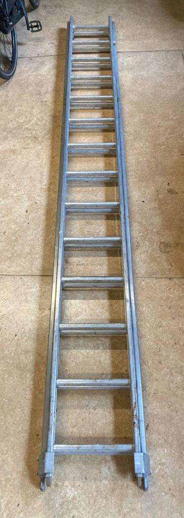 Uitschuifbare ladder 7 meter, uitschuifbaar., Doe-het-zelf en Verbouw, Ladders en Trappen, Ophalen, Gebruikt, 4 meter of meer