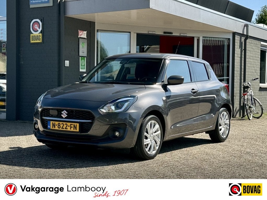 Suzuki Swift 1.2 Select Smart Hybrid Navi Camera Adaptive-Cr, Auto's, Suzuki, Keurmerk '100% Onderhouden', 83 pk, Stof, Gebruikt