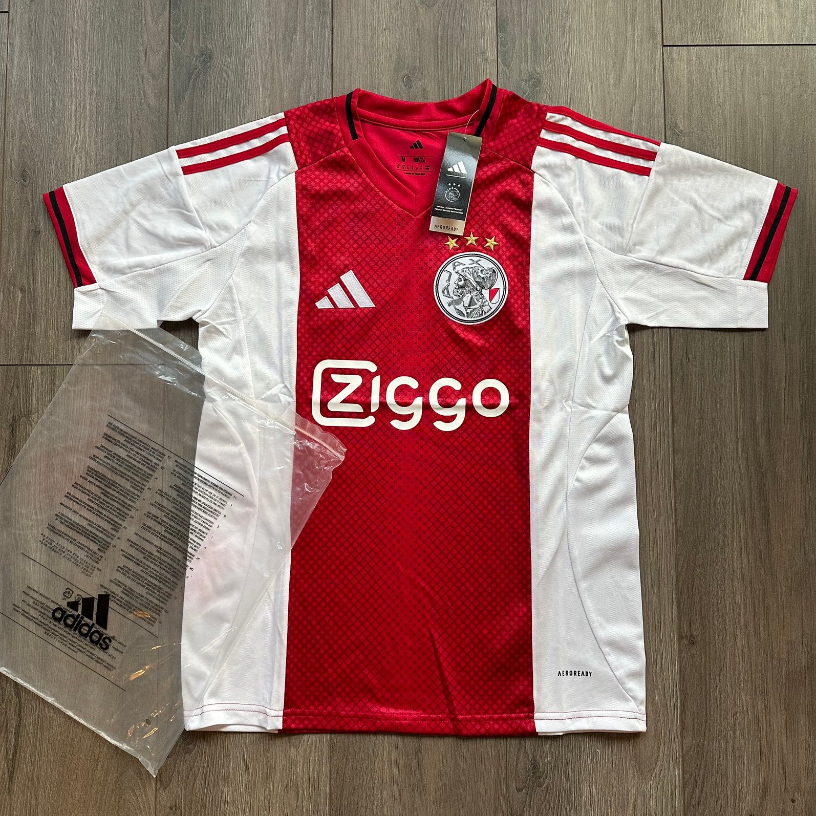 Ajax Thuisshirt 2025/26 Maat M - Nieuw met labels, Ophalen of Verzenden, Zo goed als nieuw, Rood, Voetbal