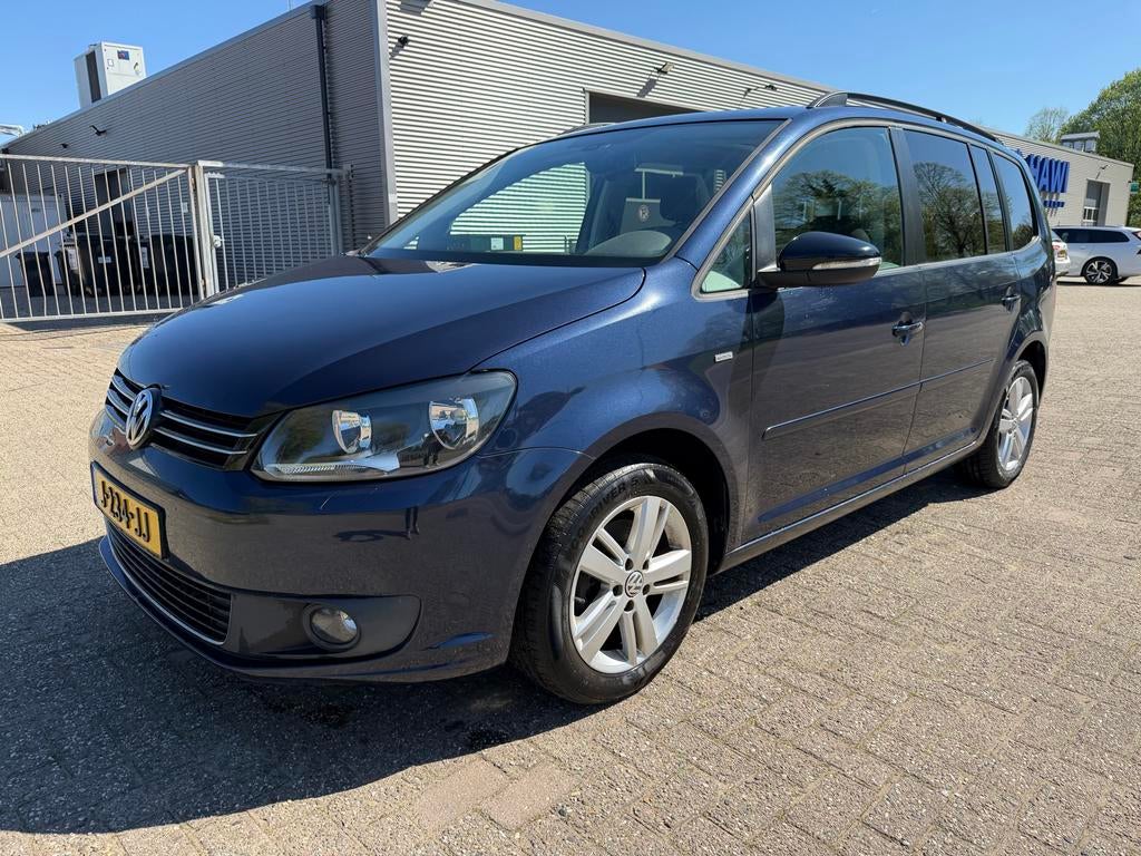 Volkswagen Touran 1.2 TSI 77KW BMT 7P 2012 Blauw, Auto's, Volkswagen, Voorwielaandrijving, Stof, 4 cilinders, Blauw