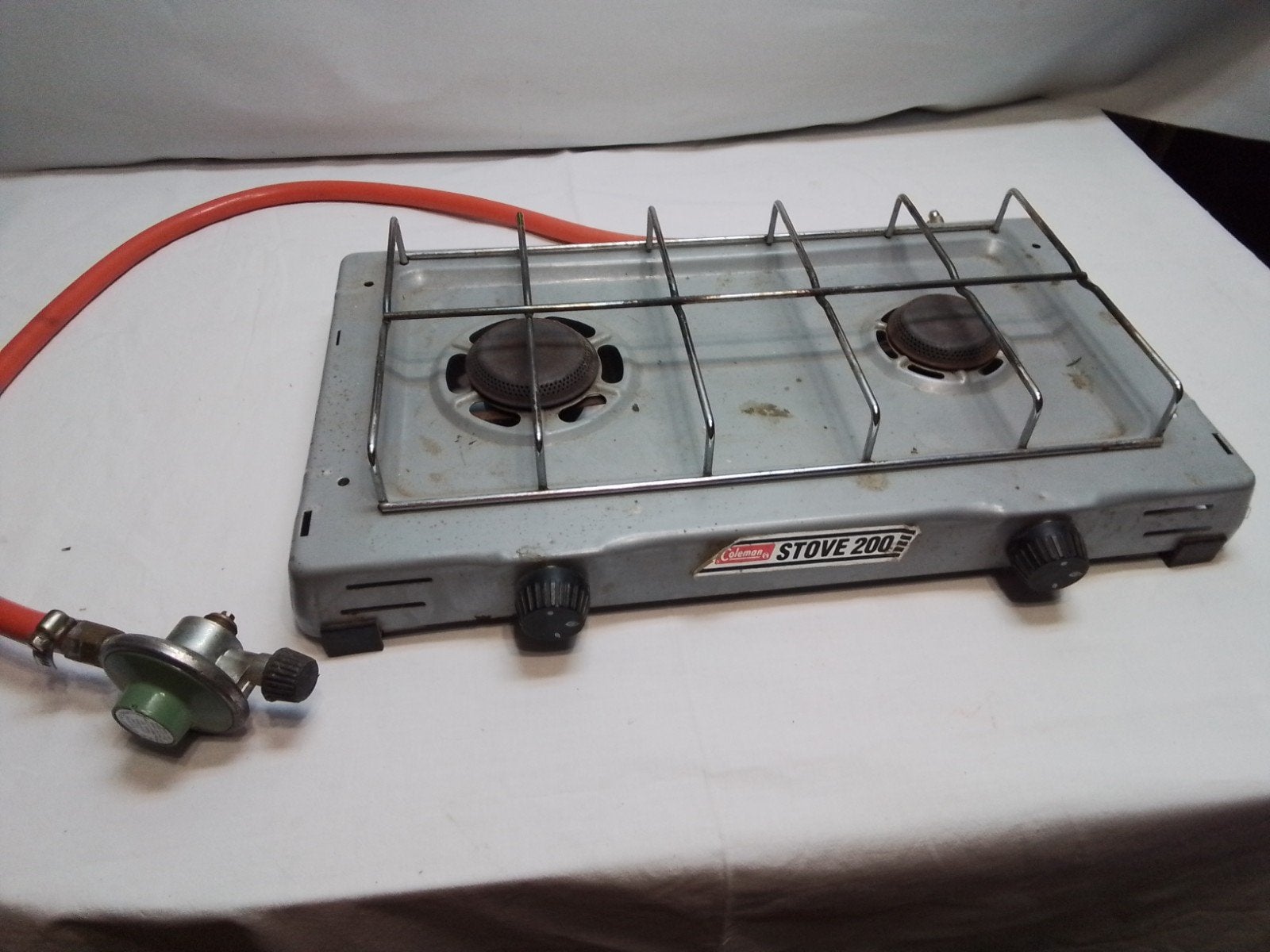 Coleman Stove 200 met gasslang en drukregelaar, Ophalen of Verzenden