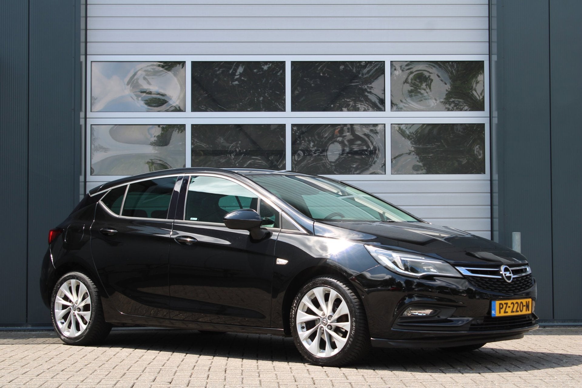 Opel Astra 1.4 Innovation 150pk Clima/Cruise/Camera/Stoel&St, Auto's, Opel, Gebruikt, 150 pk, Zwart, Bedrijf