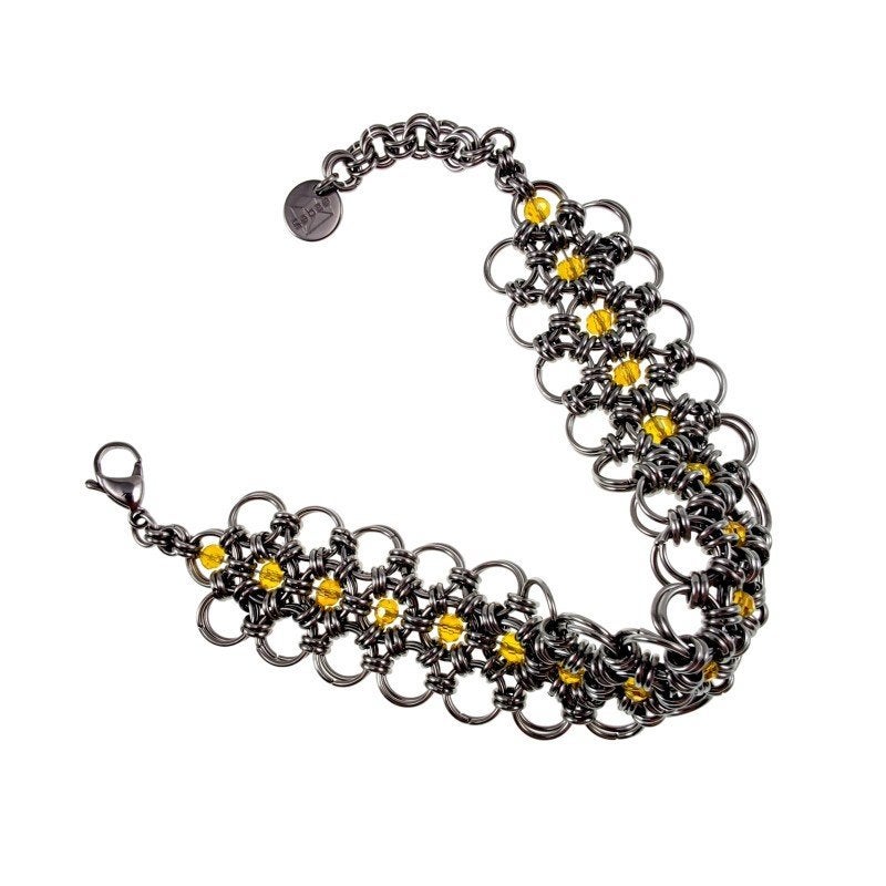 Exclusieve Brede Dames Armband RVS  | Amberkleur Kristallen, Met kristal, Staal, Birgitta-Gracht 33, 6465 EL Kerkrade, Nederland