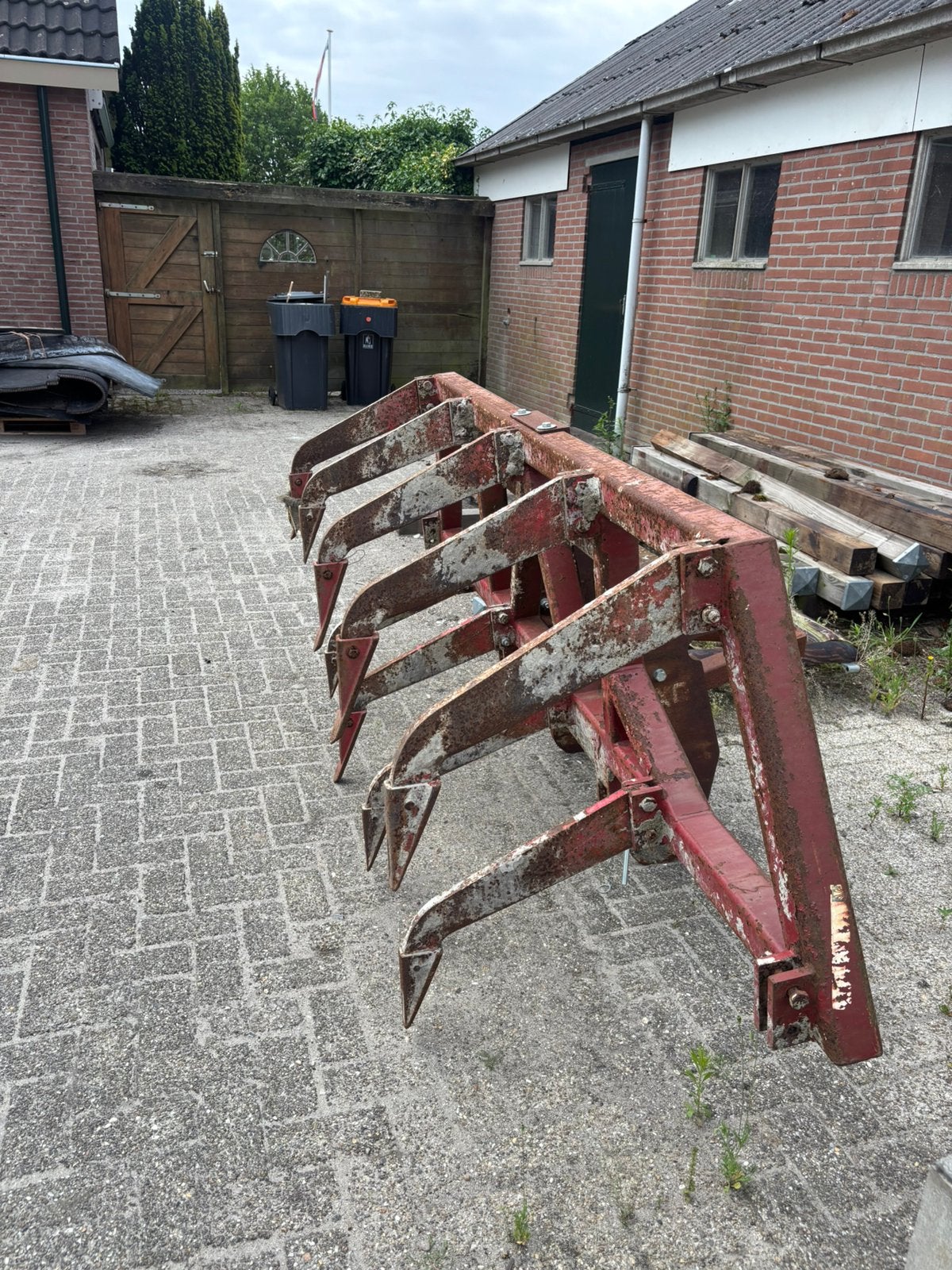Vast tand cultivator, Ophalen