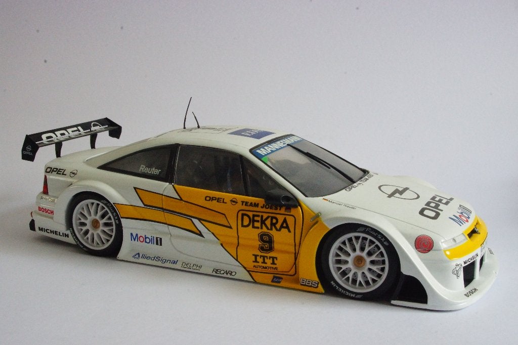 UT Models 1:18 Opel Calibra V6 DTM  Dekra 1:18 Reuter #9, Ophalen of Verzenden, Zo goed als nieuw, Auto, UT Models