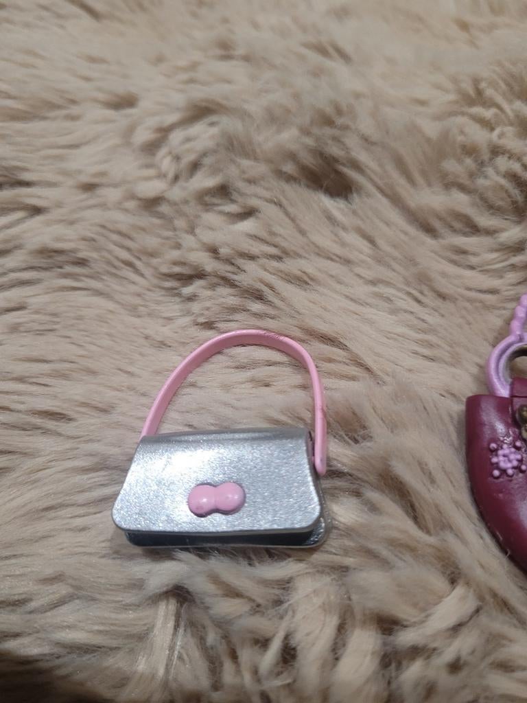 Zilverkleurig speelgoedtasje met roze strik, Ophalen of Verzenden