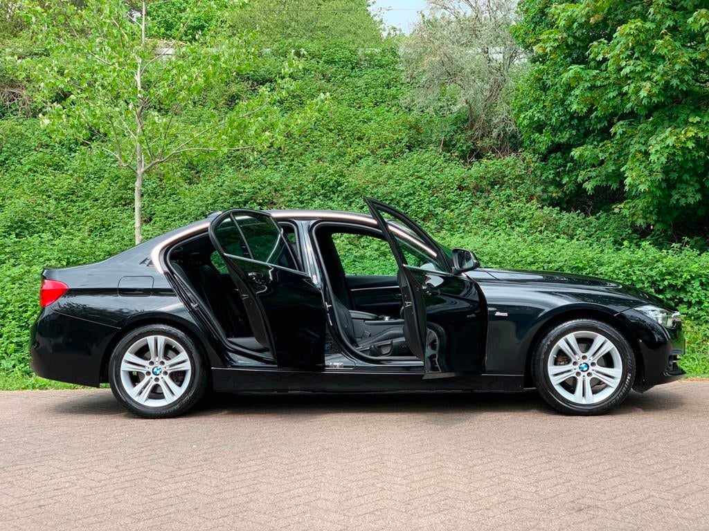 BMW 3-serie 318i Centennial High Executive AUT LEDER LUXE !, Auto's, Automaat, Gebruikt, Euro 6, Zwart