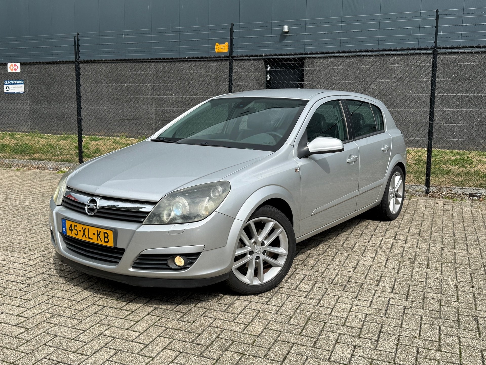 Opel Astra 1.8 Cosmo |orgNL| |Bi-xenon| |Trekhaak|, 125 pk, Gebruikt, Zwart, Origineel Nederlands