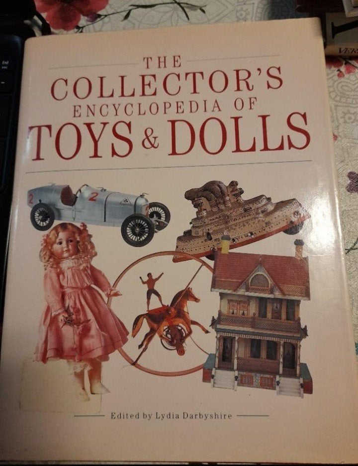 Collectors boek toys en dolls, Ophalen of Verzenden, Zo goed als nieuw