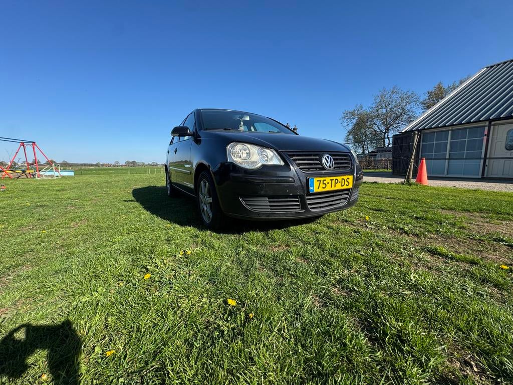 Volkswagen Polo 1.2 40KW 2007 Zwart, Voorwielaandrijving, Stof, Metallic lak, 1198 cc