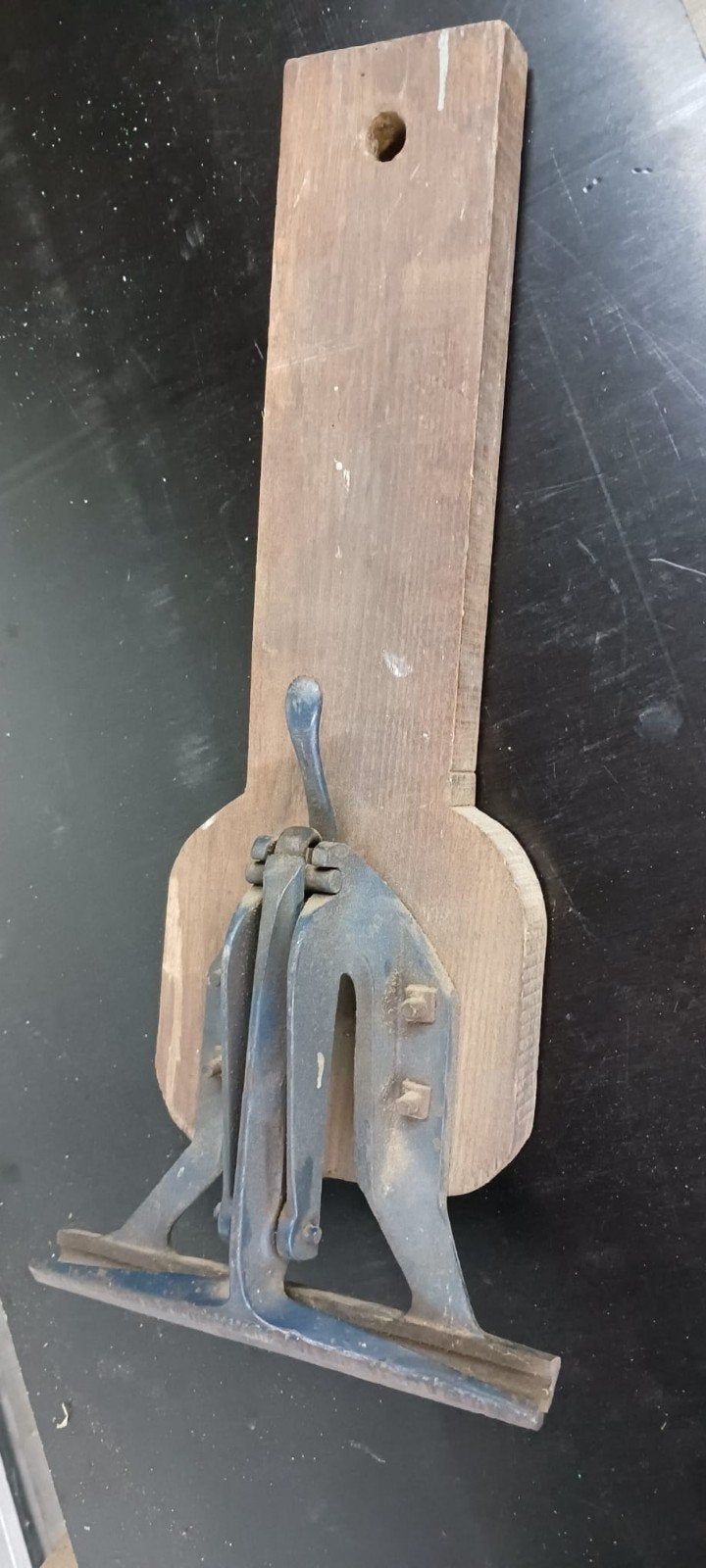 Klem voor handzaag te slijpen, Ophalen
