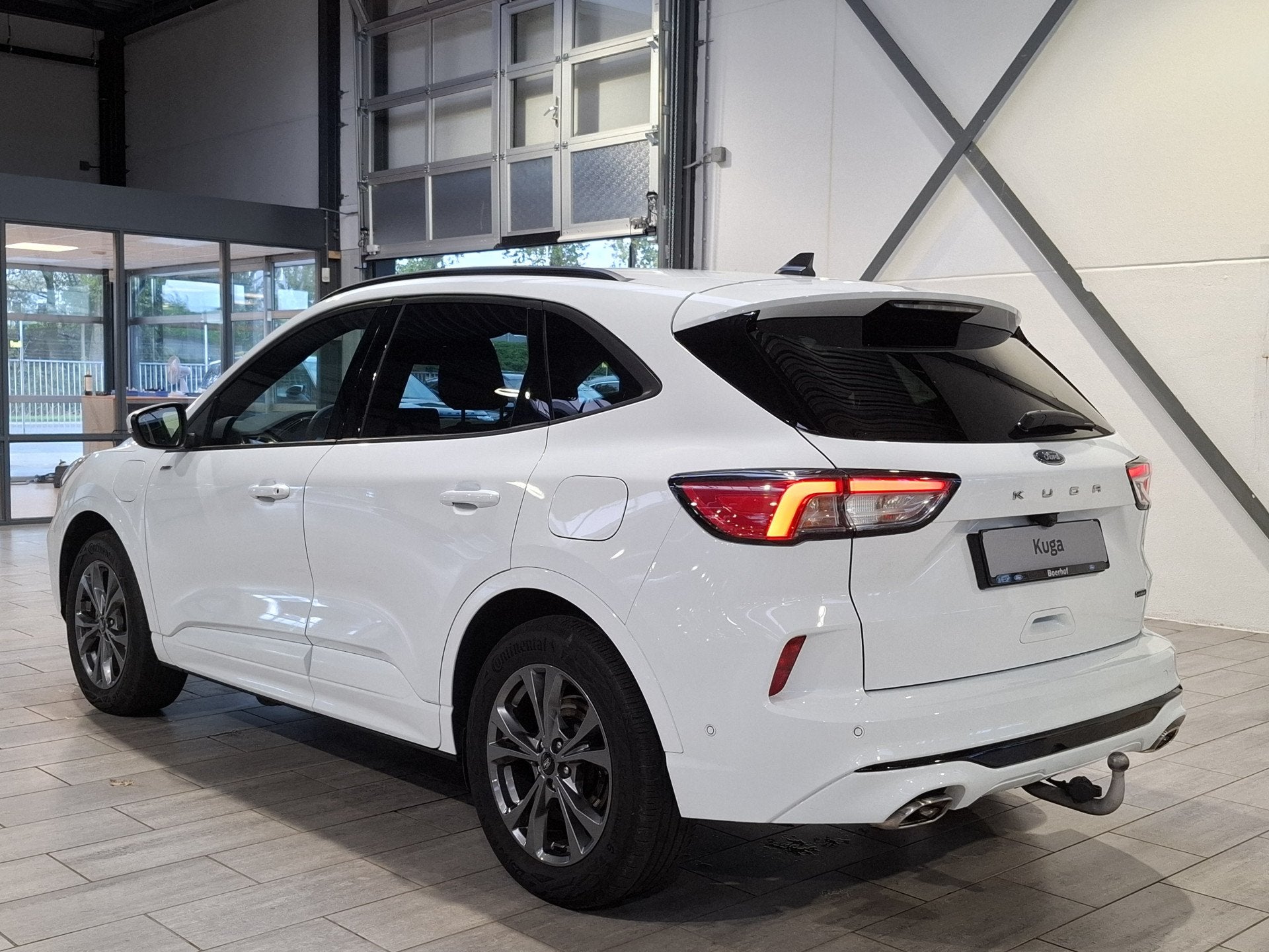 Ford Kuga 2.5 PHEV 225 pk ST-Line X | Trekhaak | Winter Pack, 14 kWh, Gebruikt, 4 cilinders, Wit