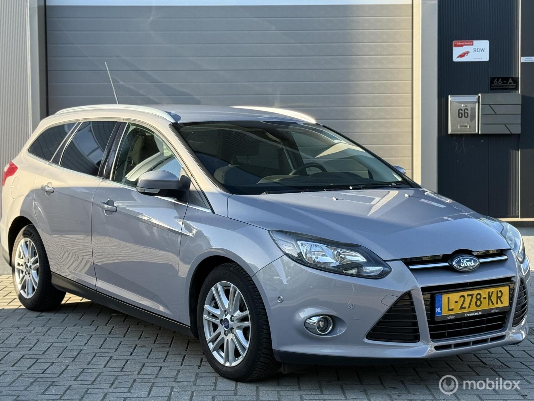 Ford Focus Wagon 1.0 EcoBoost Titanium, Auto's, Ford, Euro 5, 125 pk, Gebruikt, Handgeschakeld
