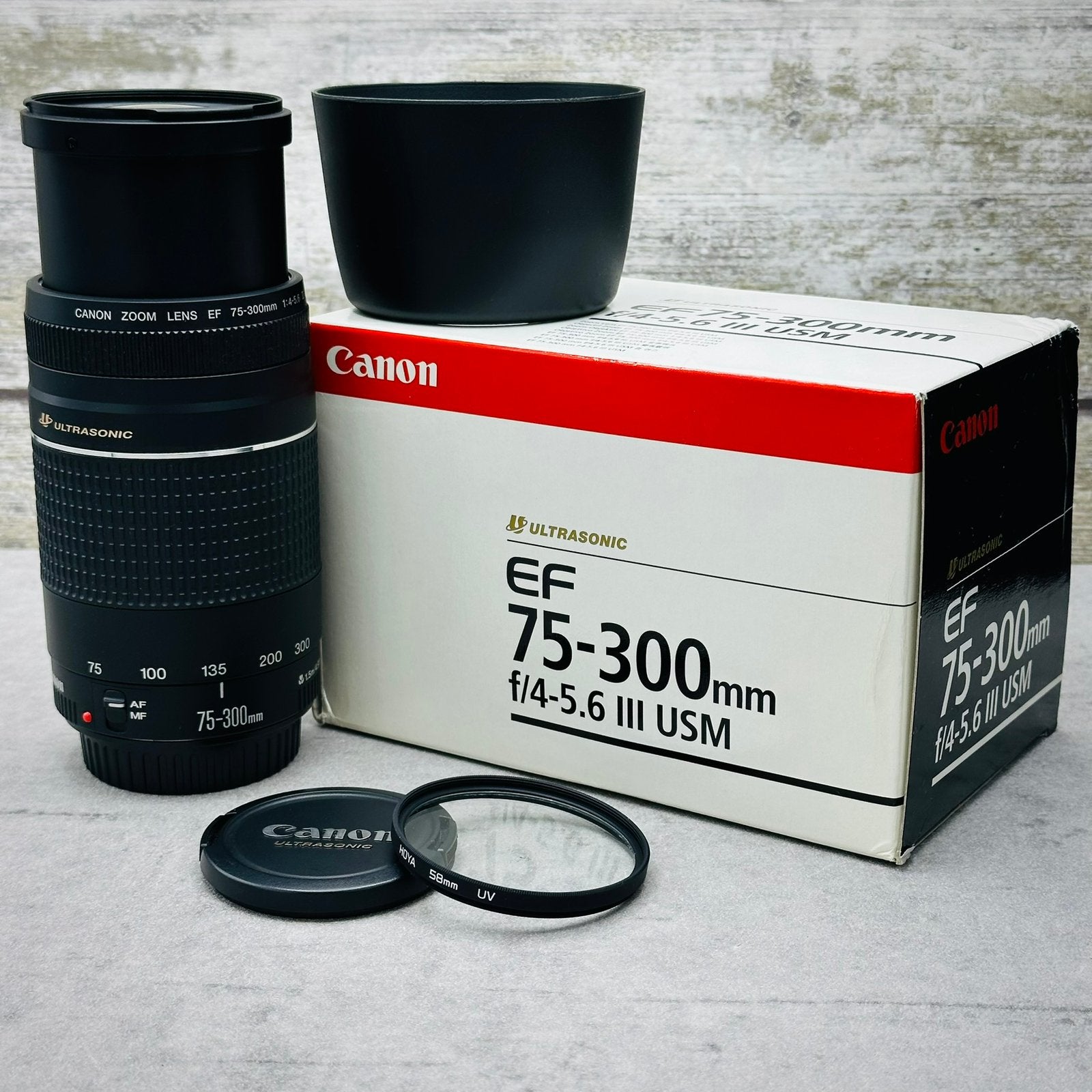 Canon EF 75-300 mm Telelens F4-5.6 MK III Zoomlens USM, Canon, Zo goed als nieuw, Zonnekap, Canon EF