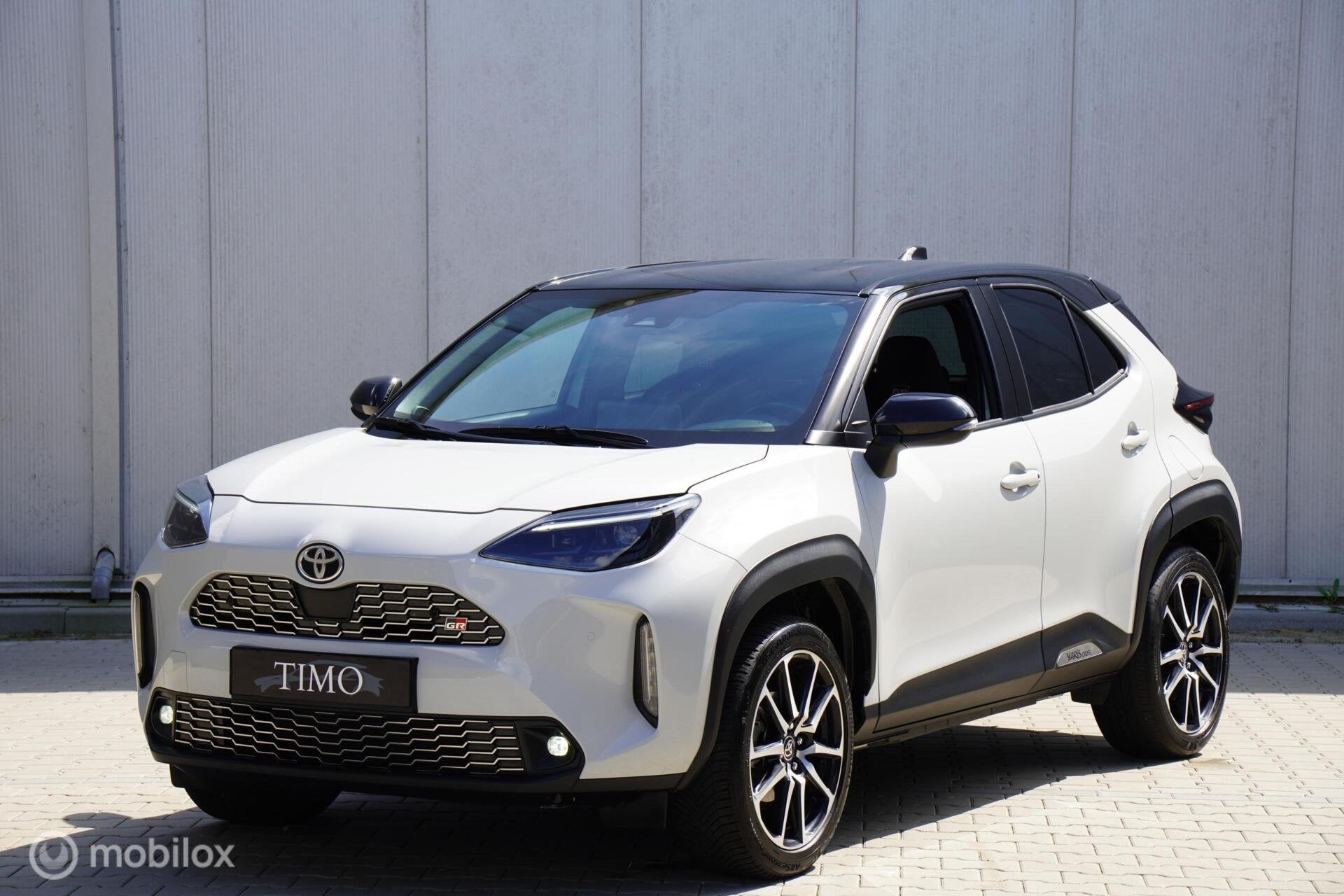 Toyota Yaris Cross 1.5 Hybrid GR Sport HUD Krijtgrijze lak, Auto's, Gebruikt, 116 pk, Bedrijf, Automatische klimaatregeling
