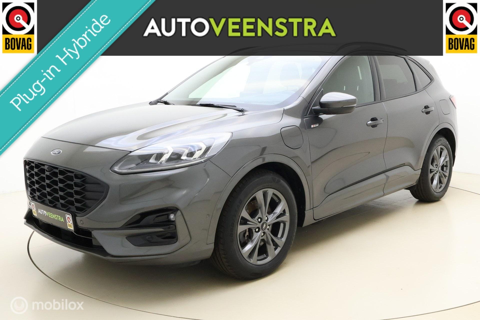 Ford Kuga 2.5 PHEV ST-Line|LUXE|B&O|TREKH|STOEL/STUUR.VERW, Auto's, Gebruikt, Zwart, 4 cilinders, Met garantie (alle)
