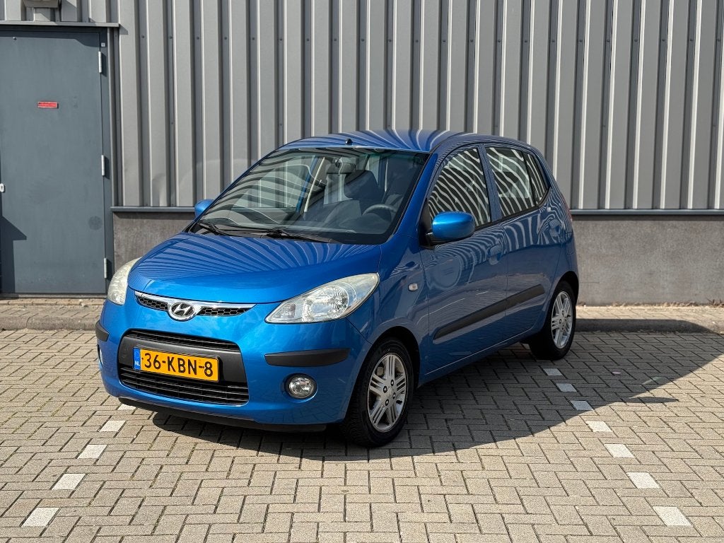 Hyundai i10 1.1 I 5DR 2009 Blauw met Airco, Auto's, Voorwielaandrijving, 31 €/maand, 4 cilinders, Origineel Nederlands