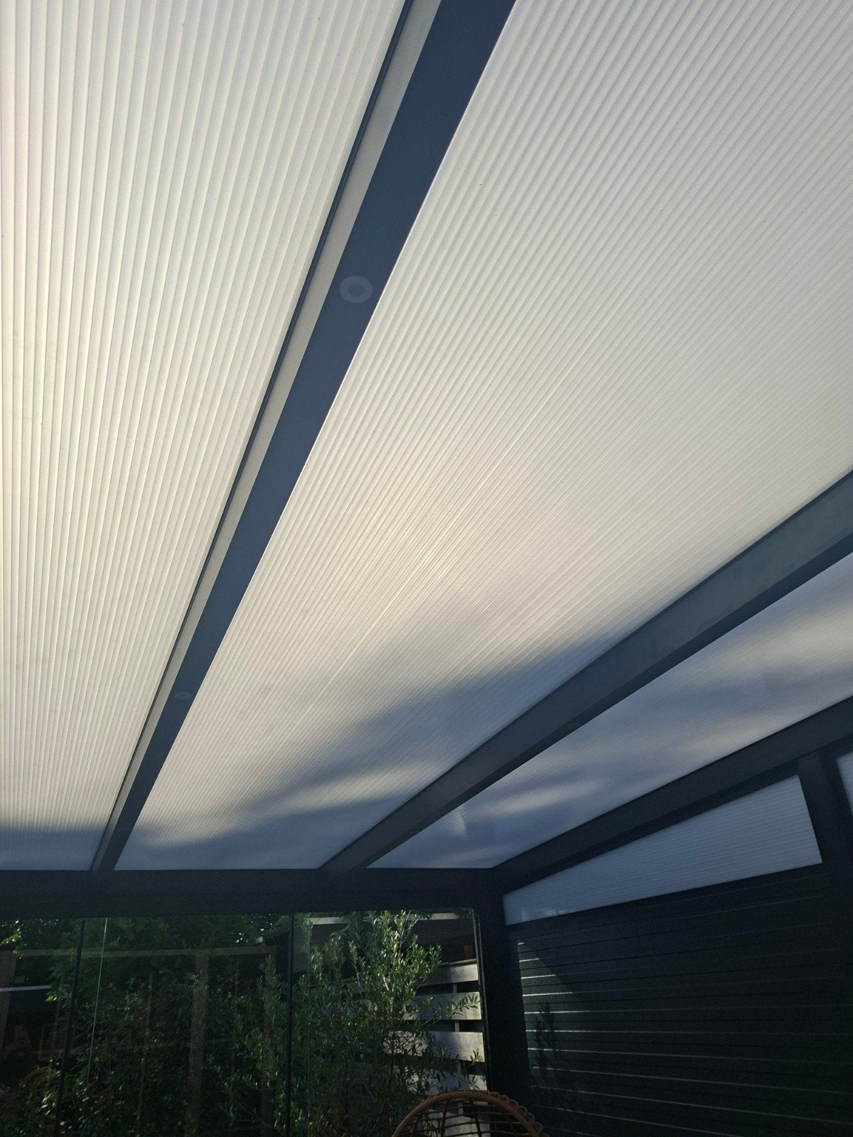 Foto 6 van Moderne Veranda/Tuinkamer met Glazen Schuifwanden