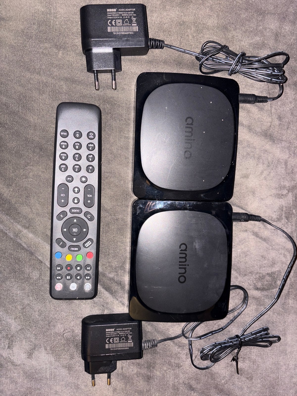 2x Amino Aria 610 Decoders met afstandsbediening en adapters, Ophalen of Verzenden, Gebruikt