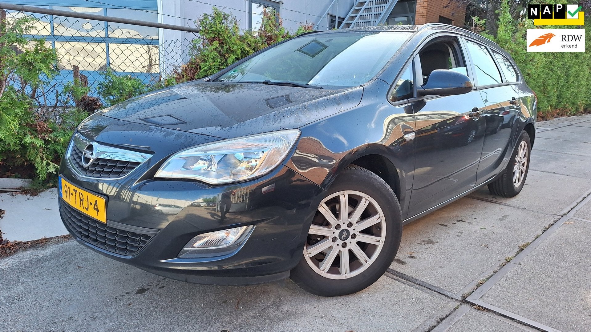 Opel Astra Sports Tourer 1.4 Business Edition, Auto's, Voorwielaandrijving, Euro 5, 101 pk, Gebruikt