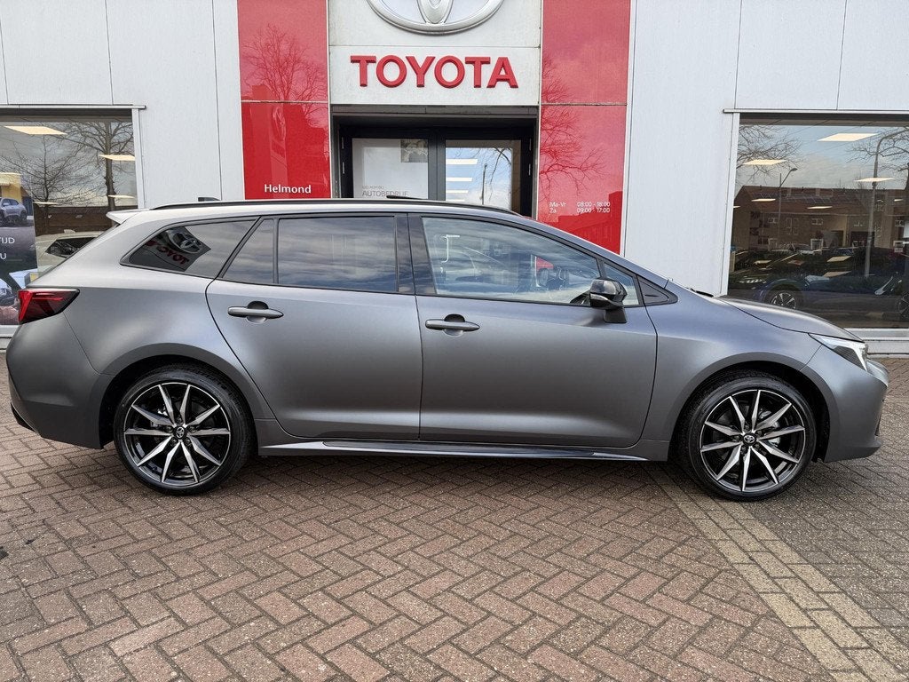 Toyota Corolla Touring Sports Hybrid 180 GR Sport Kage Limit, Auto's, Gebruikt, Euro 6, 4 cilinders, 1415 kg
