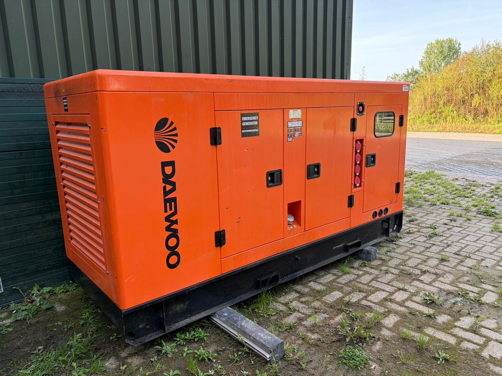 Daewoo DAGS-100 met slechts 400 draaiuren, Ophalen, Zo goed als nieuw, 30 kVA of meer, Elektrisch startend