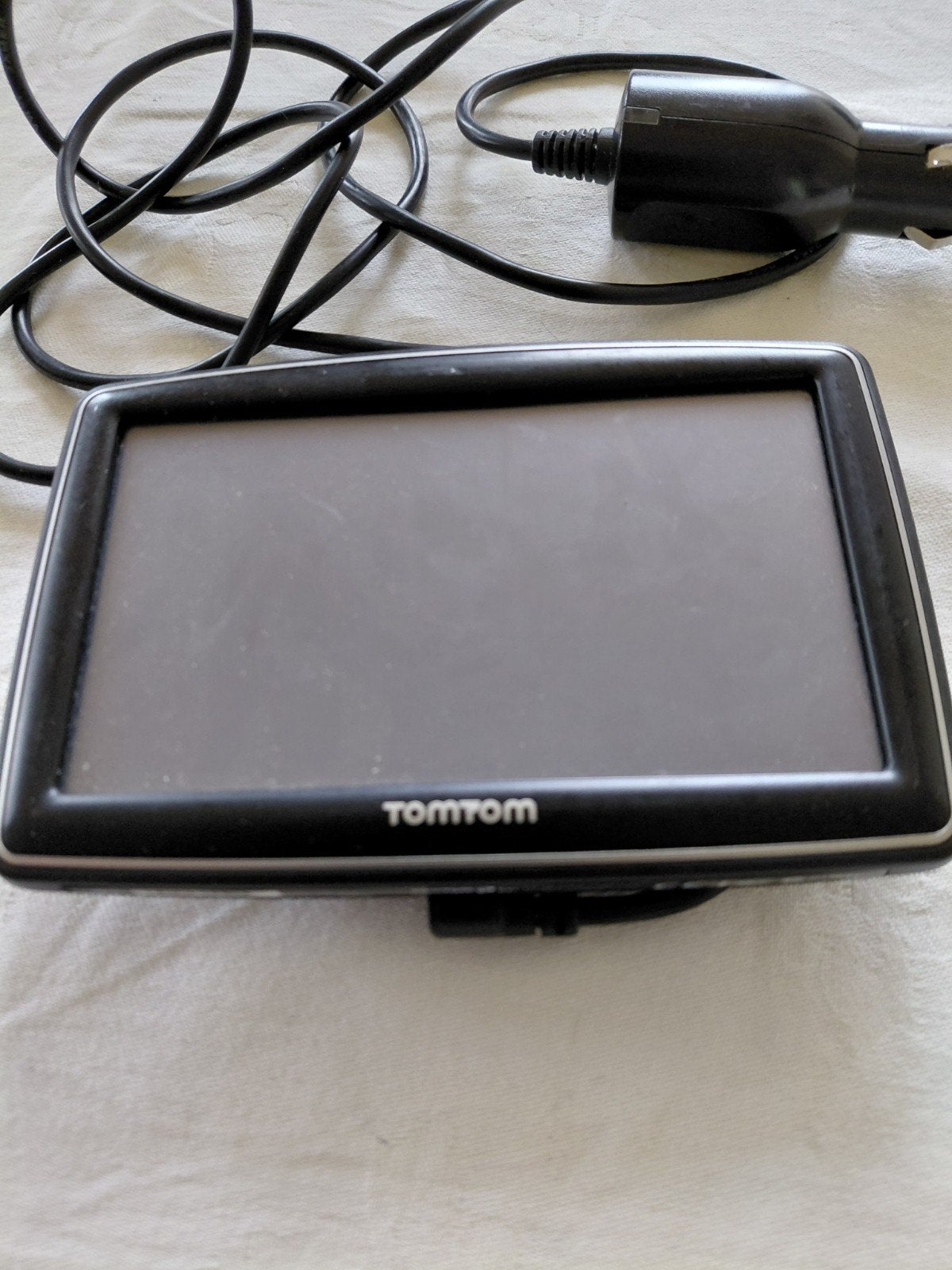 TomTom navigatiesysteem met autolader, Ophalen of Verzenden, Gebruikt