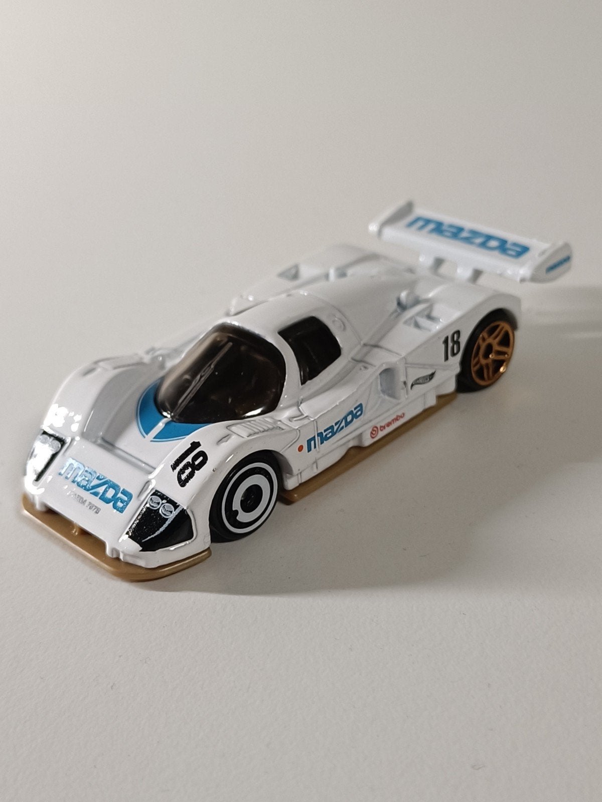 Hot Wheels Mazda 787B - Wit - Schaalmodel, Hobby en Vrije tijd, Modelauto's | Overige schalen, Ophalen of Verzenden, Zo goed als nieuw