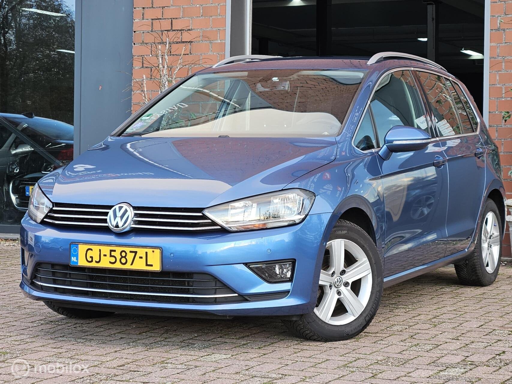 Volkswagen Golf Sportsvan 1.2 TSI Automaat Navi cruise clima, Gebruikt, 4 cilinders, Blauw, Bedrijf