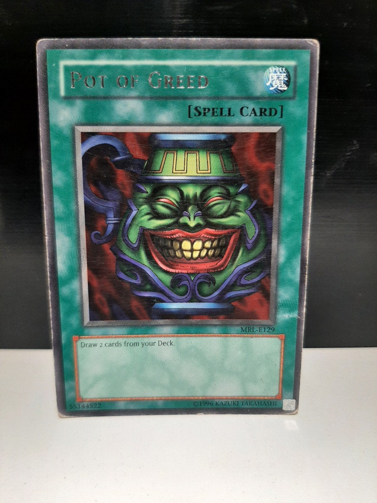 Yu-Gi-Oh! Pot of Greed MRL-E129 Spell Card, Ophalen of Verzenden, Gebruikt, Losse kaart