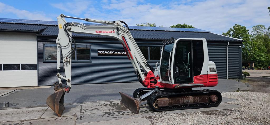 Takeuchi TB285 (bj 2012), Zakelijke goederen, Machines en Bouw | Kranen en Graafmachines, Graaflaadcombinatie