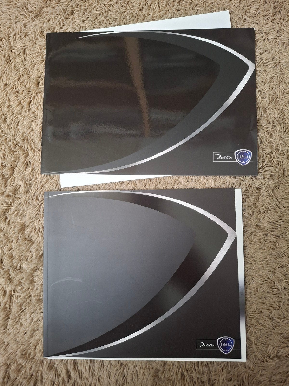 2x autofolder Lancia Delta, Verzenden, Gelezen, Overige merken