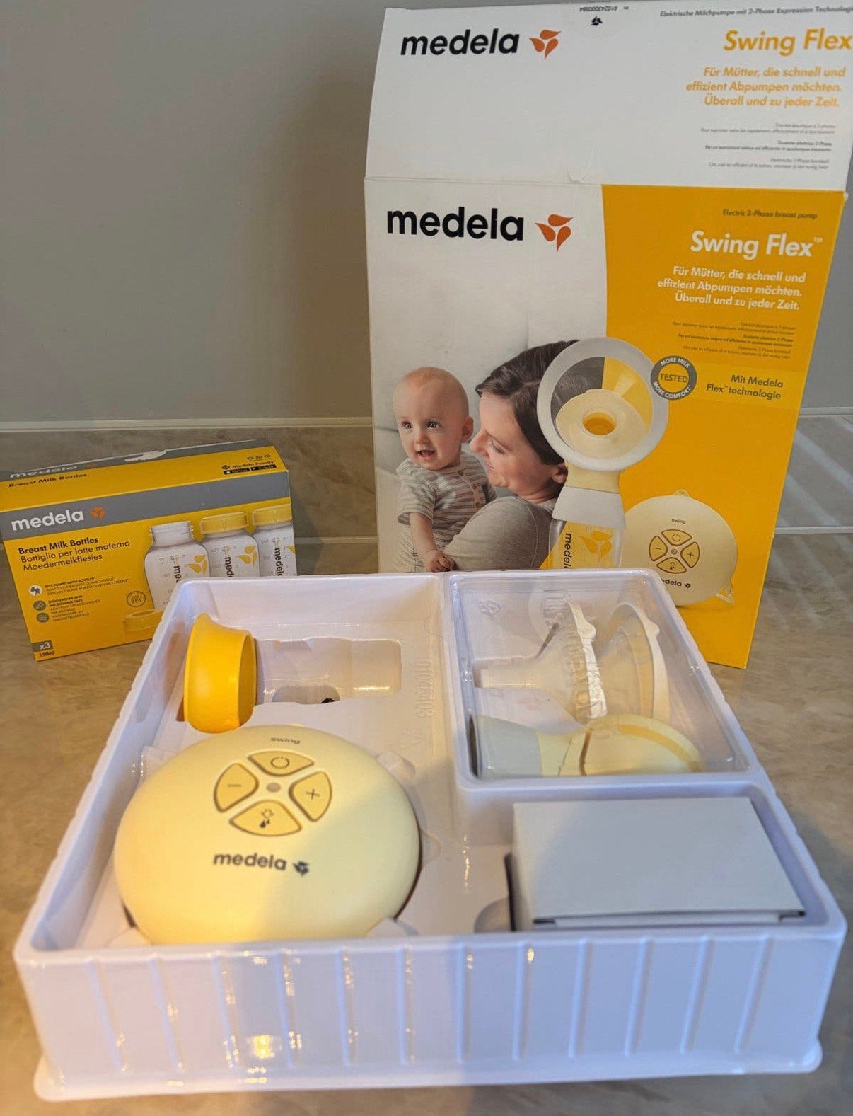 Medela Swing Flex borstkolf compleet met extra flesjes, Ophalen of Verzenden, Zo goed als nieuw, Borstkolf, Medela