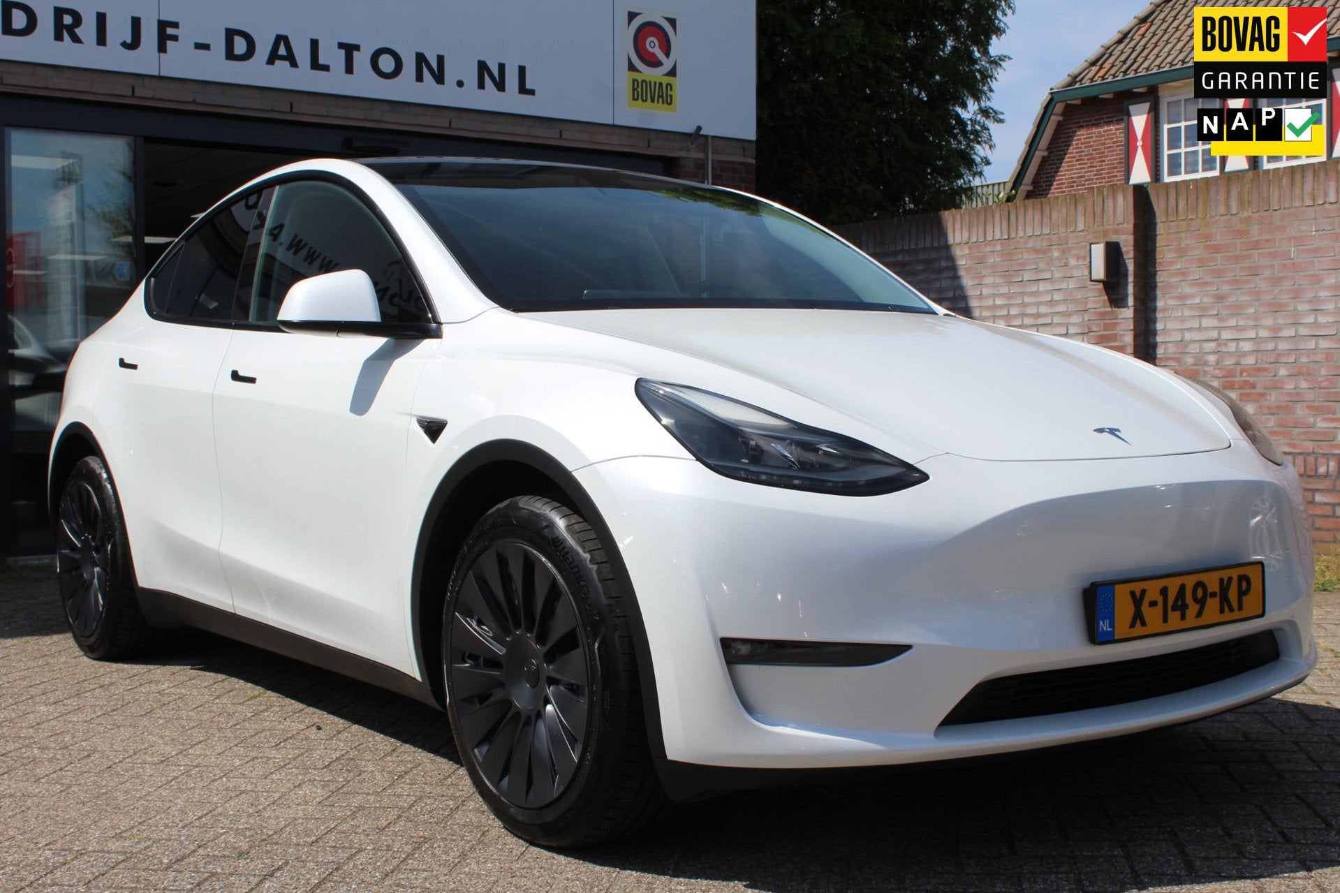 Tesla Model Y Long Range AWD 75 kWh SOH 96,1% LAGE KM! / 1e, Auto's, Gebruikt, Zwart, Wit, Vierwielaandrijving