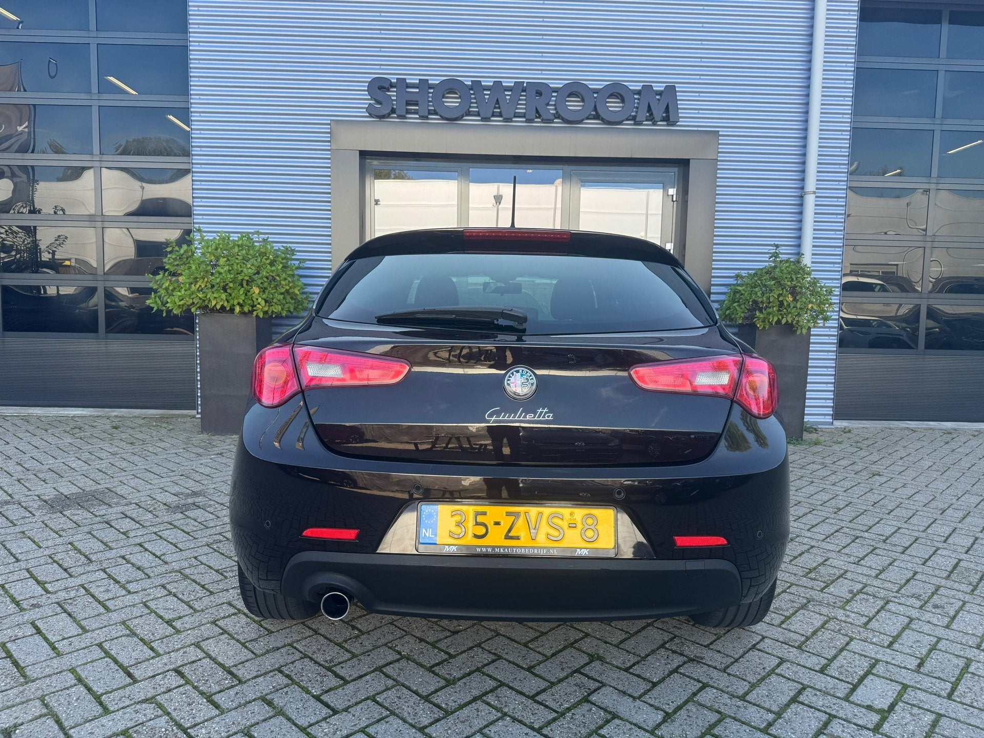 Alfa Romeo Giulietta 1.4 T Business Executive AUTOMAAT|PDC|L, Auto's, Zwart, 4 cilinders, Leder en Stof, Zwart