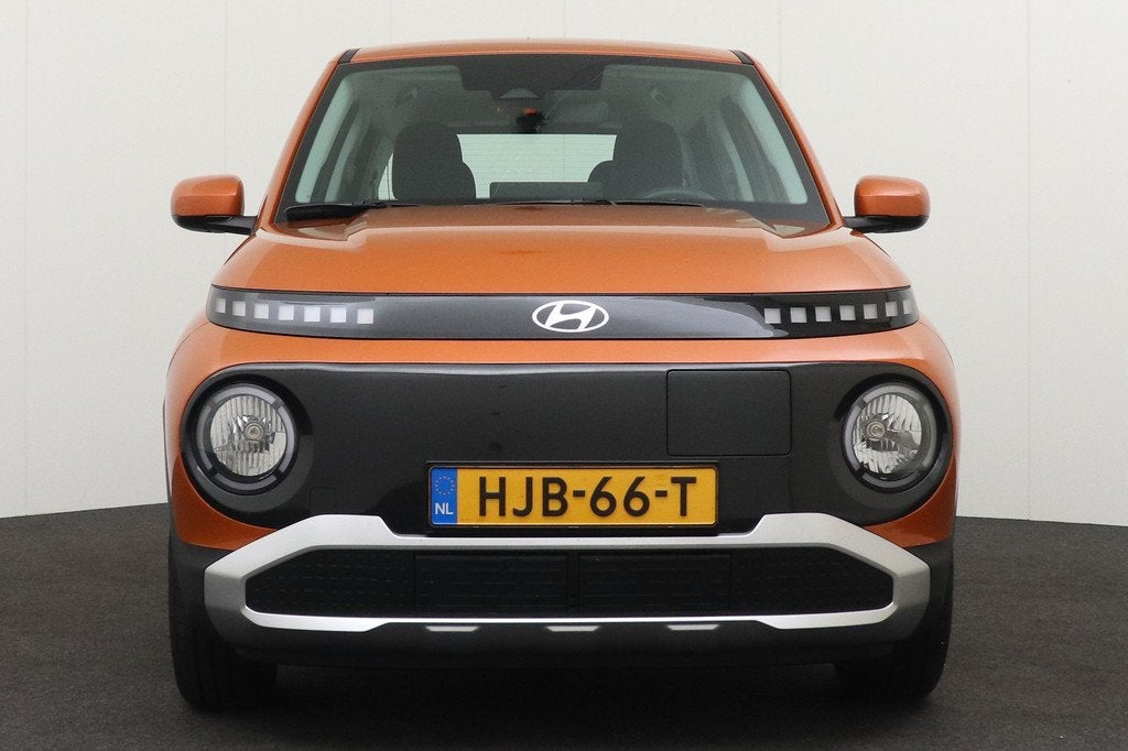 Hyundai Inster E-Motion 42 kWh Carplay Adapt. Cruise Camera, Auto's, Hyundai, Stof, Zwart, Overige kleuren, Origineel Nederlands