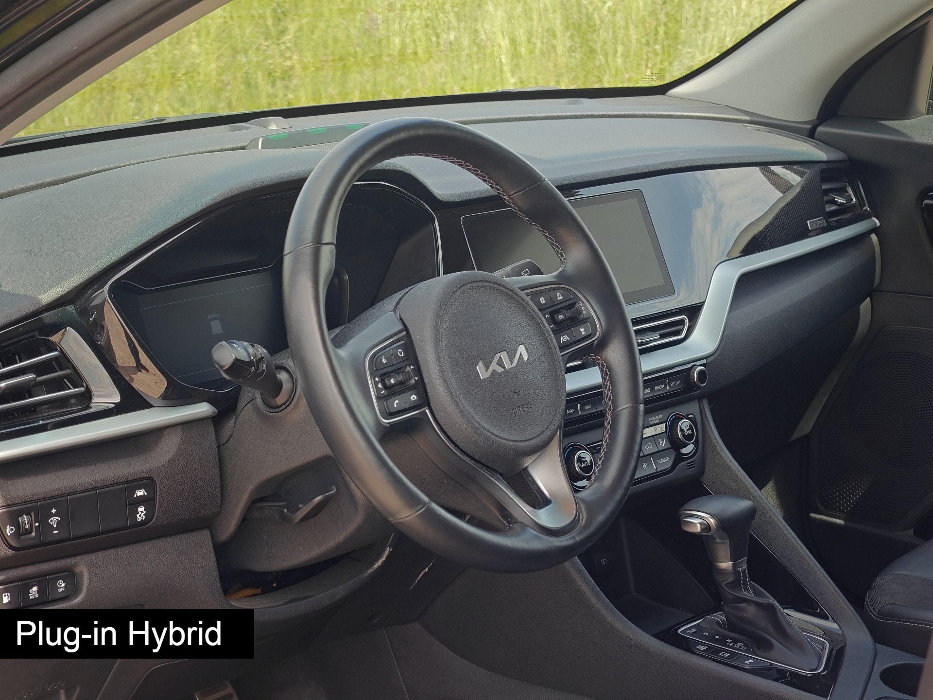 Kia Niro 1.6 GDi PHEV DynamicLine (bj 2022, automaat), Gebruikt, Zwart, Leder en Stof, Zwart