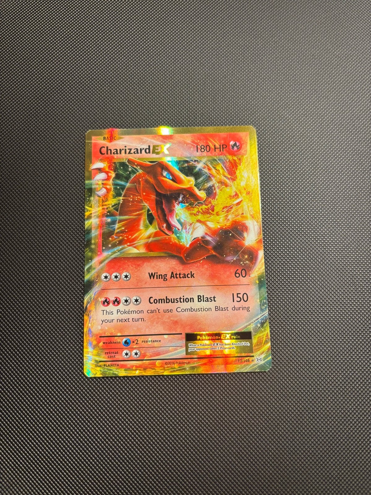 Charizard EX Pokémon Kaart -  12/106 Foil, Hobby en Vrije tijd, Verzamelkaartspellen | Pokémon, Ophalen of Verzenden, Zo goed als nieuw
