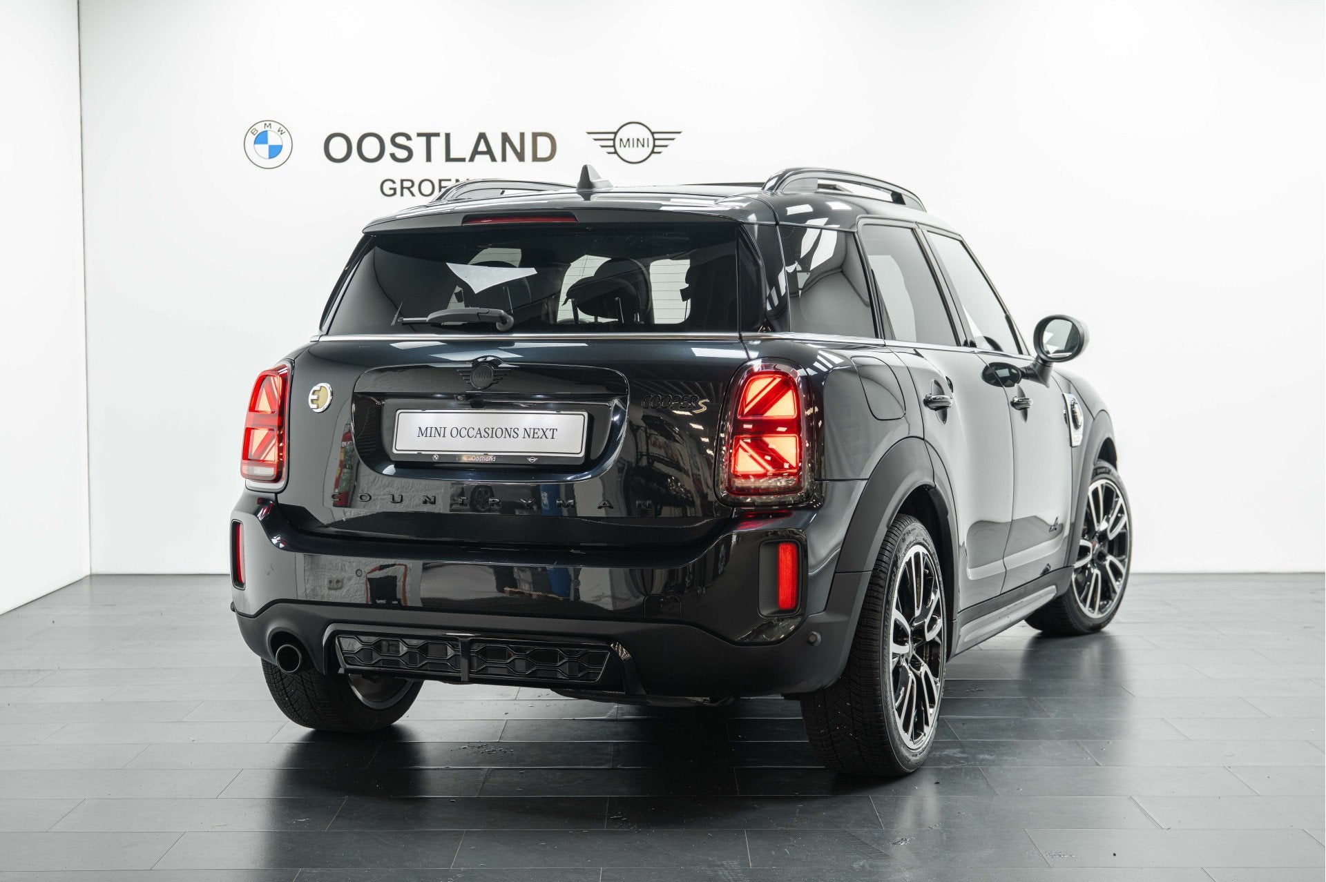 MINI Countryman Cooper S E ALL4 JCW Automaat / Panoramadak /, Auto's, Automaat, Gebruikt, Countryman, Zwart