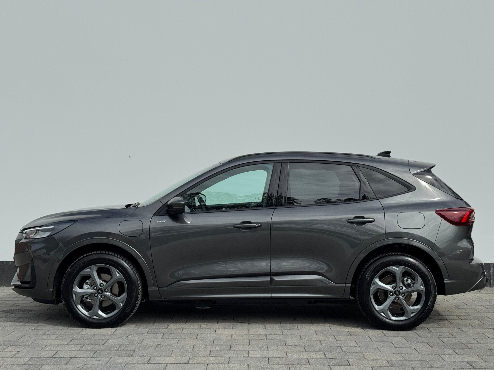 Ford Kuga 2.5 PHEV ST-Line | Trekhaak Elektrisch | All-Seaso, Auto's, Zwart, 4 cilinders, Plug-in hybride, Bedrijf