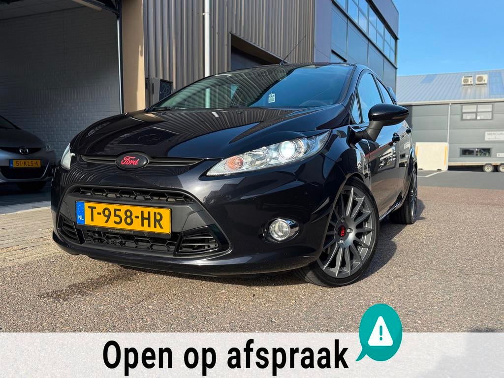 Ford Fiesta 1.25 Ghia UITLAATKLEP LED STOEL VERWARMING, Auto's, Voorwielaandrijving, Euro 5, Met garantie (alle), 82 pk