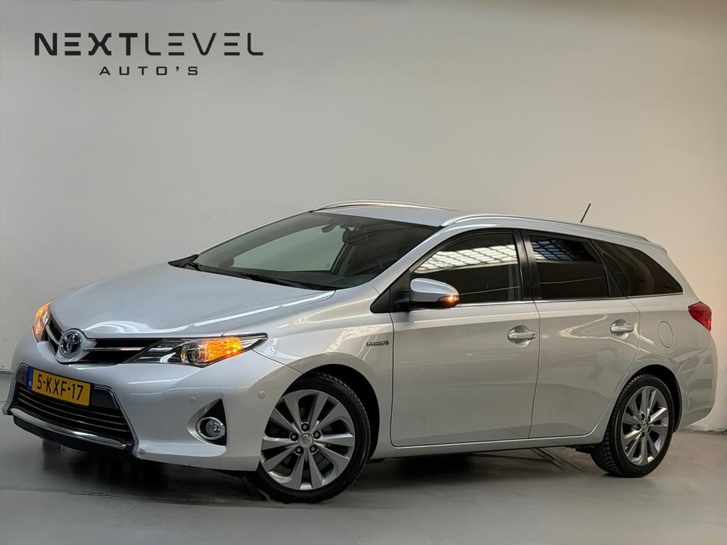 Toyota Auris Touring Sports 1.8 Hybrid Executive Stoelverwar, Auto's, Euro 5, Gebruikt, Leder en Stof, Origineel Nederlands