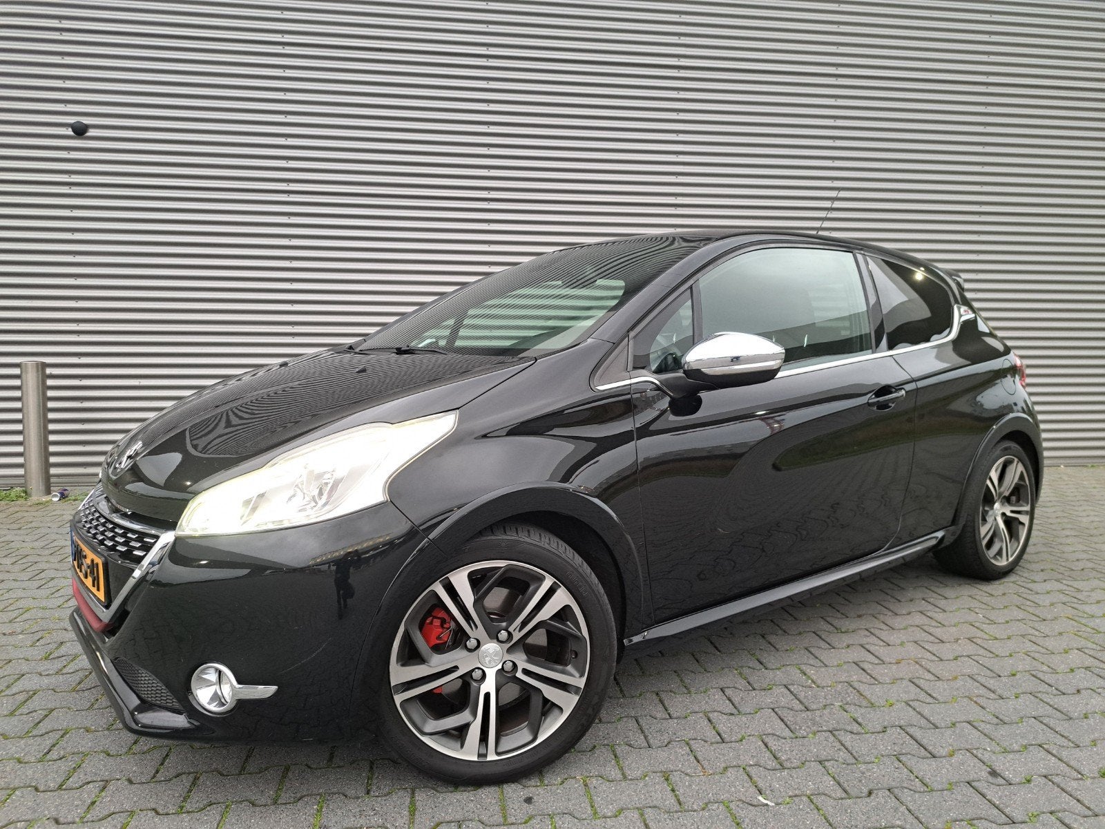 Peugeot 208 1.6 GTI 147KW 3-D 2014 Zwart, Auto's, Voorwielaandrijving, Leder en Stof, Origineel Nederlands, Handgeschakeld