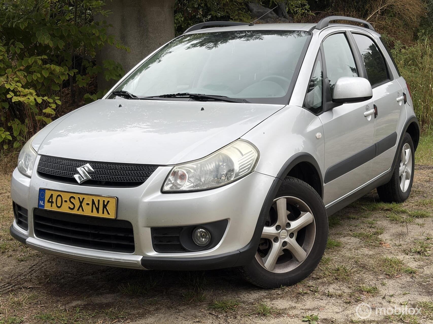 Suzuki SX4 1.6 4x4...Zeer nette Auto..Koude Airco, Auto's, Gebruikt, Zwart, 4 cilinders, Handgeschakeld