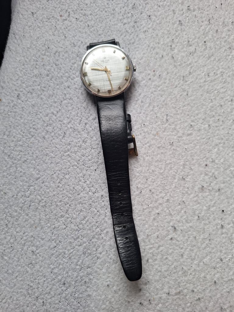 Vintage Revue horloge moet weg, Ophalen