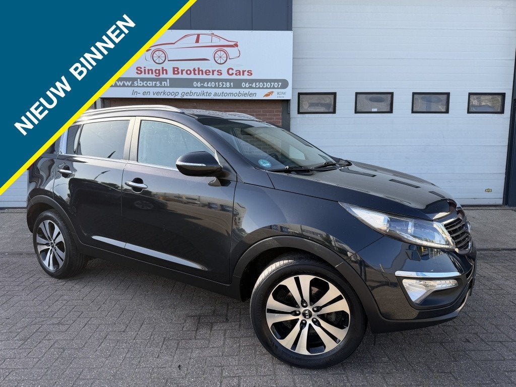 Kia Sportage 2.0 X-clusive First/AUT/LEER/NAVI/NAP/KEYLEES !, Gebruikt, Zwart, 4 cilinders, 1600 kg
