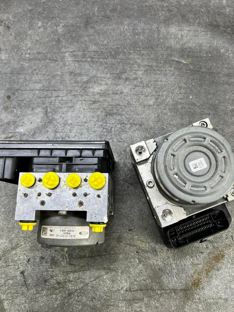 ABS pomp Ford Fiesta D1B1-2C405-AE D1B12C405AE, Auto-onderdelen, Remmen en Aandrijving, Ford, Gereviseerd, Ophalen of Verzenden