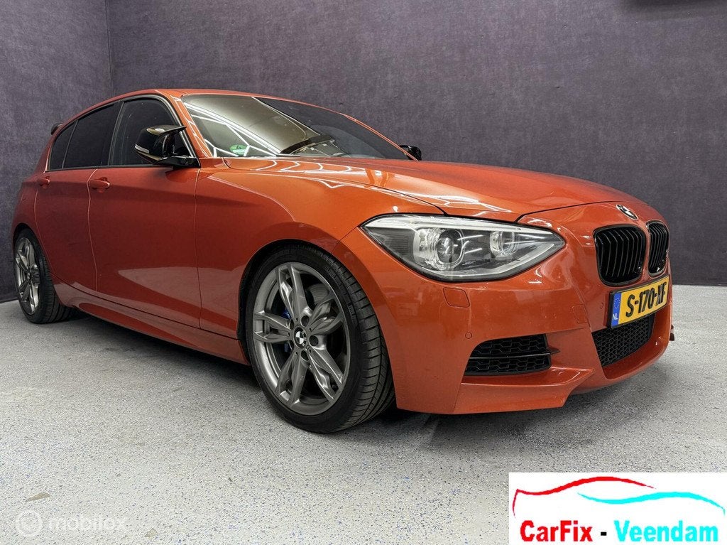 BMW 1-serie M135i xDrive Business+, Auto's, Euro 5, Overige kleuren, 320 pk, Leder