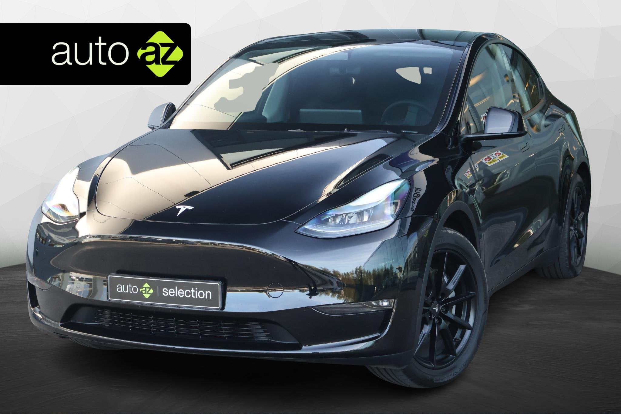 Tesla Model Y Long Range AWD 75 kWh / Panoramadak, Auto's, Stof, Gebruikt, Zwart, Origineel Nederlands