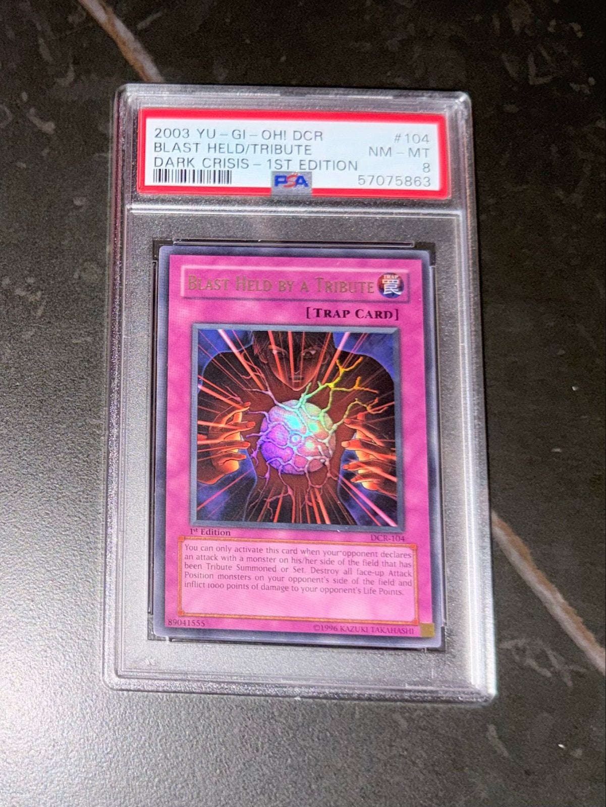 Yu-Gi-Oh! Blast Held by a Tribute DCR 1st Edition PSA 8, Ophalen of Verzenden, Zo goed als nieuw, Losse kaart, Foil